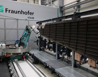 Fraunhofer IFAM high precision milling robot machines a CFRP vertical tail plane of an aircraft