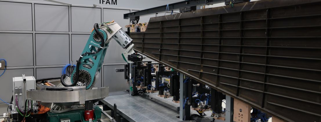 Fraunhofer IFAM high precision milling robot machines a CFRP vertical tail plane of an aircraft